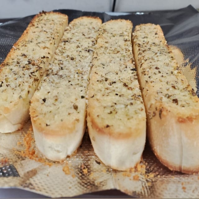 Breadsticks with sauce.
